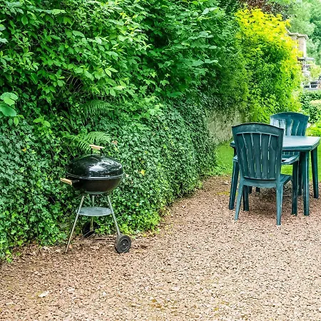 A Small Studio Of A Nature Stone House