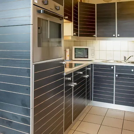 A Small Studio Of A Nature Stone House